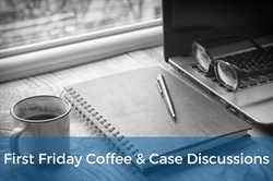 [ai] A coffee mug next to an open notebook and a pen, with a laptop and glasses in the background. The image promotes a discussion event titled 'First Friday Coffee & Case Discussions'. Natural light comes through a window.